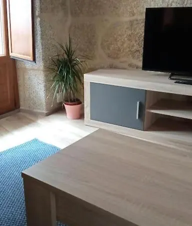 Casa De Piedra Céntrica. Hébergement de vacances Ribeira